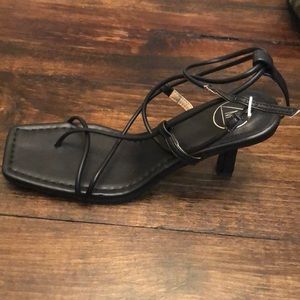 Black strapy heels! Size 8, brand new never worn.
